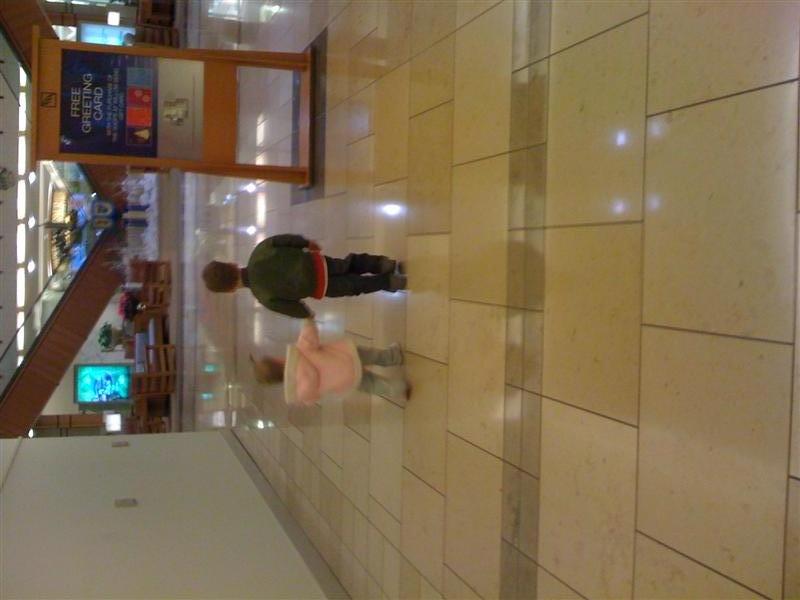 JessWLittleDude-Mall.jpg - Big brother took me to the mall to play...